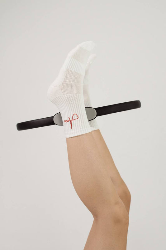 5 priežastys, kodėl Pilates kojinės pagerina tavo treniruotę